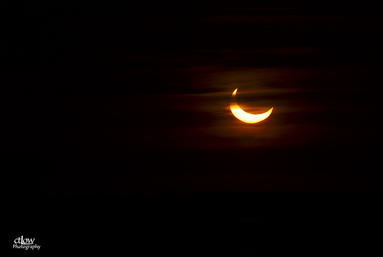 Partial solar eclipse at sunrise